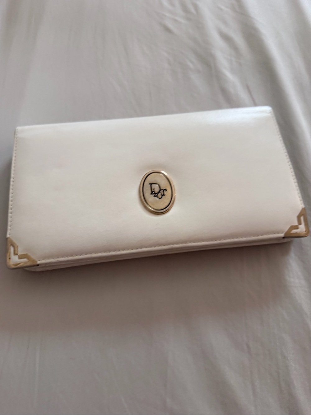 Vintage Christian Dior Leather Clutch with Gold Emblem